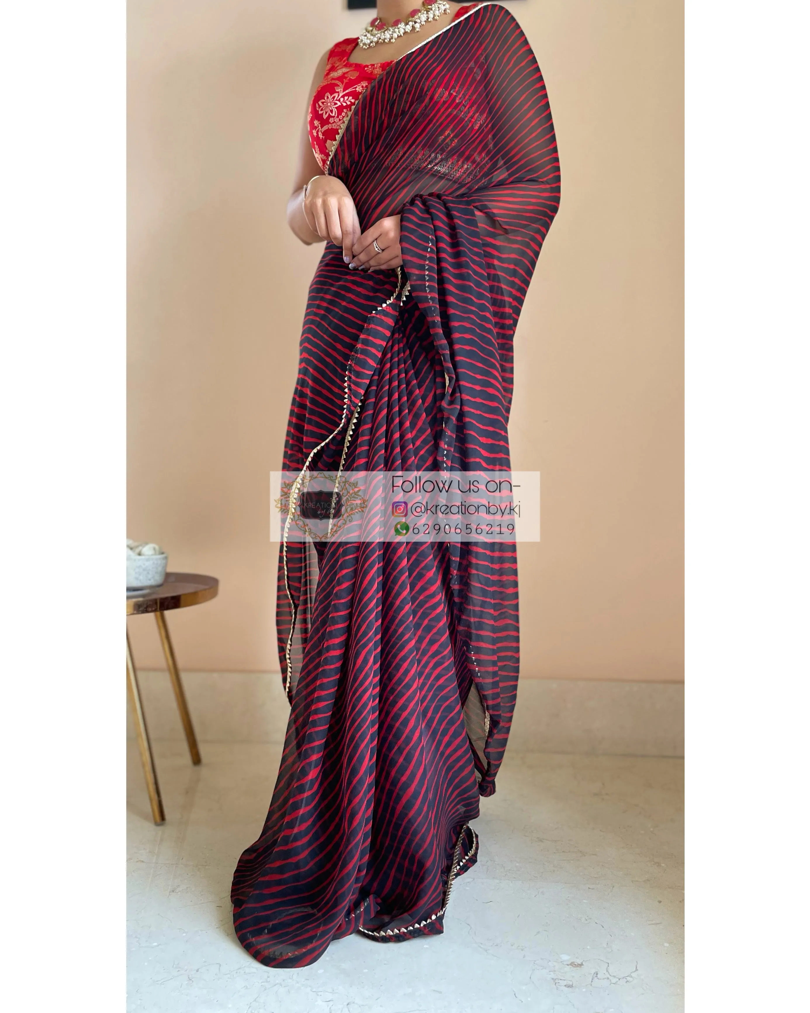 Black and Maroon Georgette Leheriya Saree